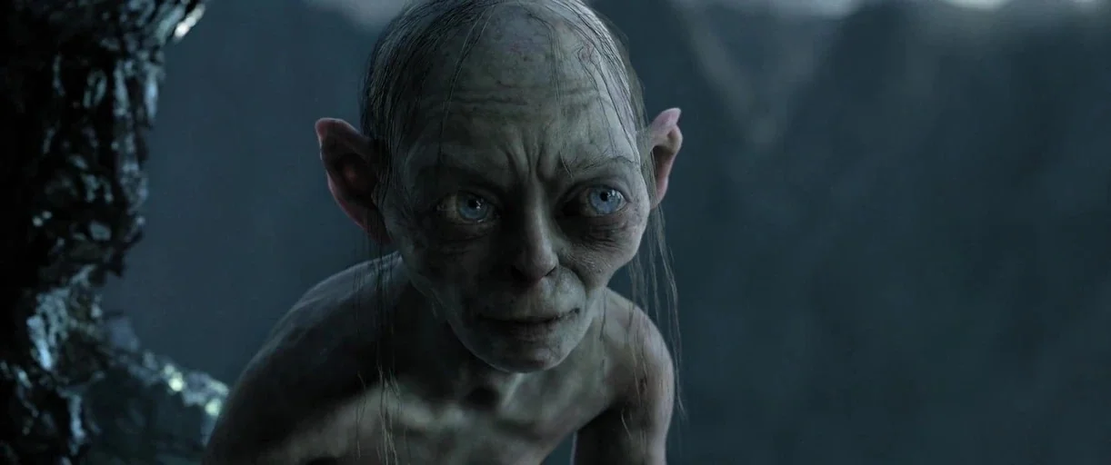 The Lord of The Rings: The Return of the King (2003) movie still: closeup — A dark rocky mountain environment at night with blurred stone textures…