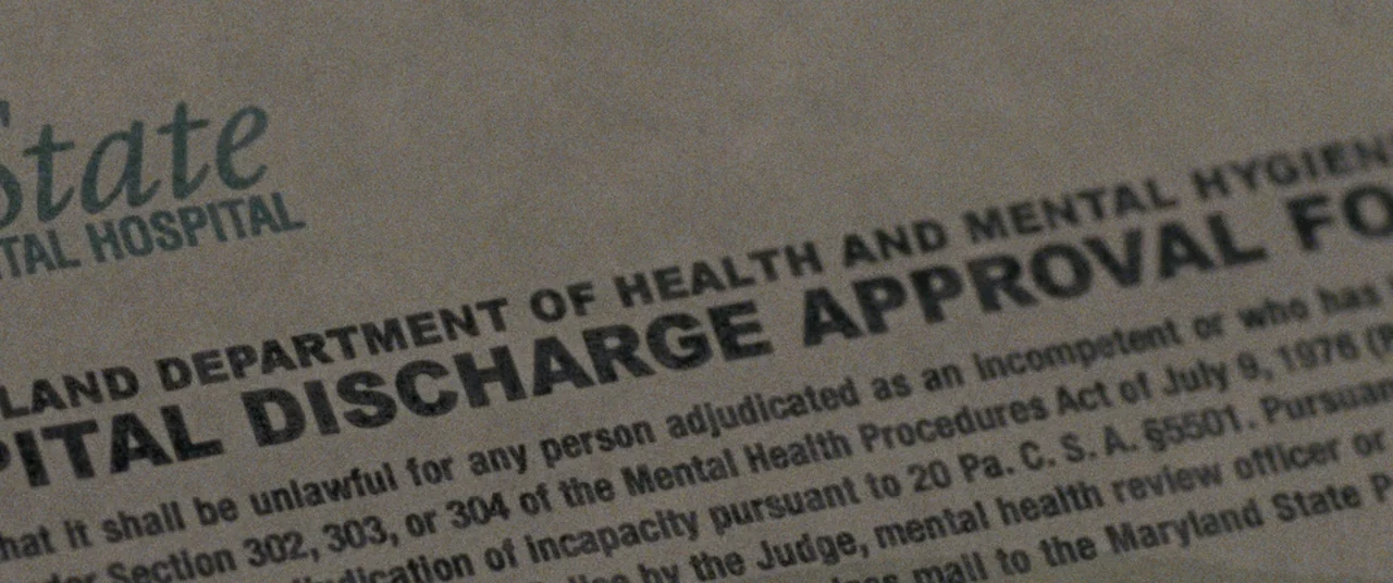 Silver Linings Playbook (2012) movie still: closeup — A close-up view shows a typed official document from the Maryland Department of Health. The…