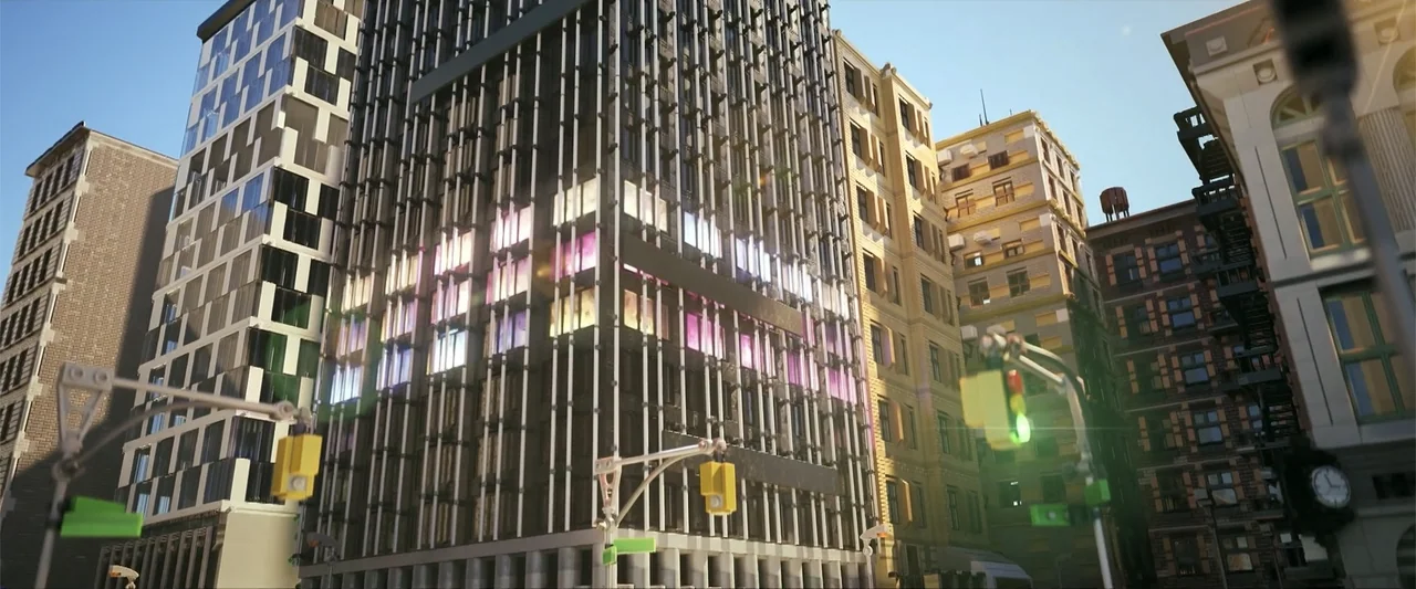 Piece by Piece (2024) movie still: wide — A dense urban intersection features a tall modern skyscraper surrounded by older brick apartment…
