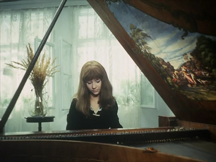 Valerie & Her Week of Wonders (1970) movie still: medium — A light-filled room features a large harpsichord with a painted lid and a window. A woman…