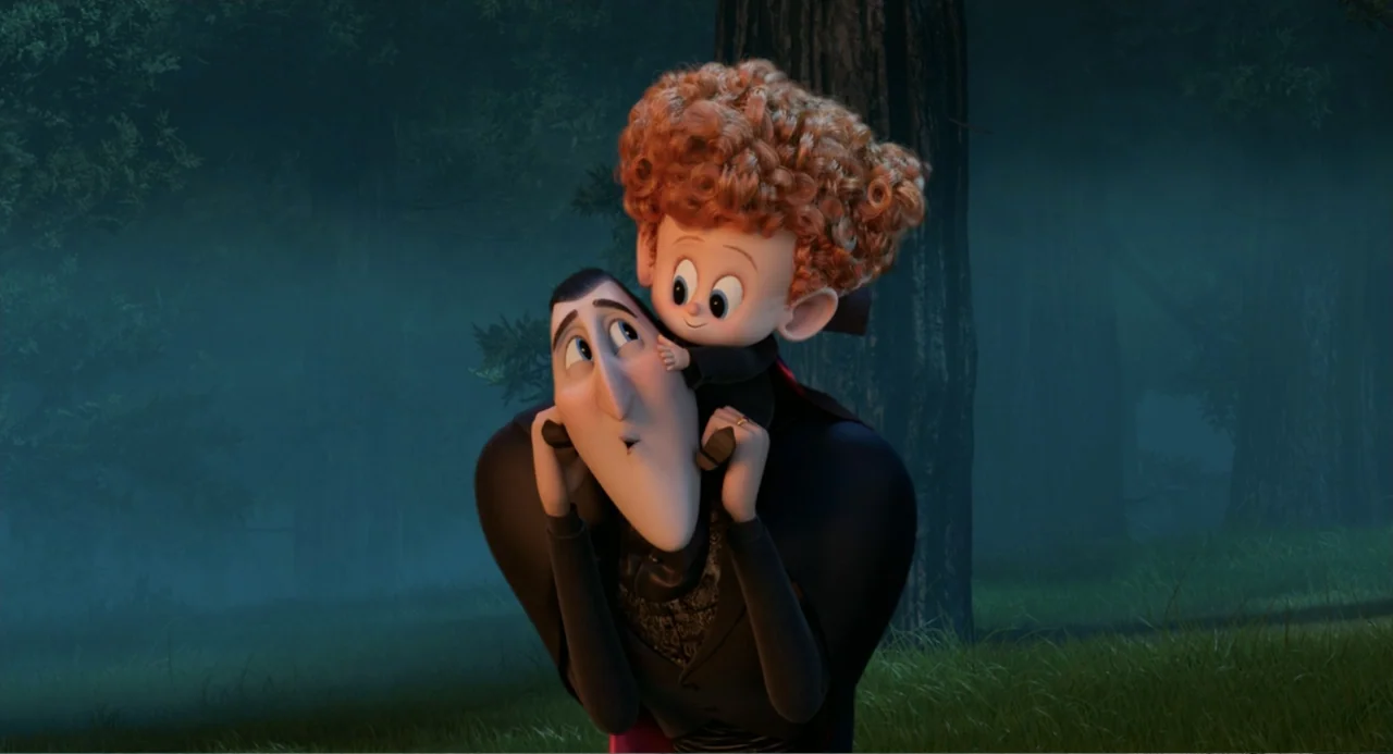 Hotel Transylvania 2 (2015) movie still: medium — A dark, misty woodland clearing is filled with trees and dim night light. A pale man in a black…
