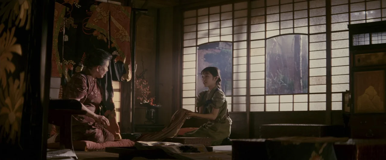 Memoirs of a Geisha (2005) movie still: wide — A traditional Japanese room features shoji screens that allow filtered light to cast shadows. An…