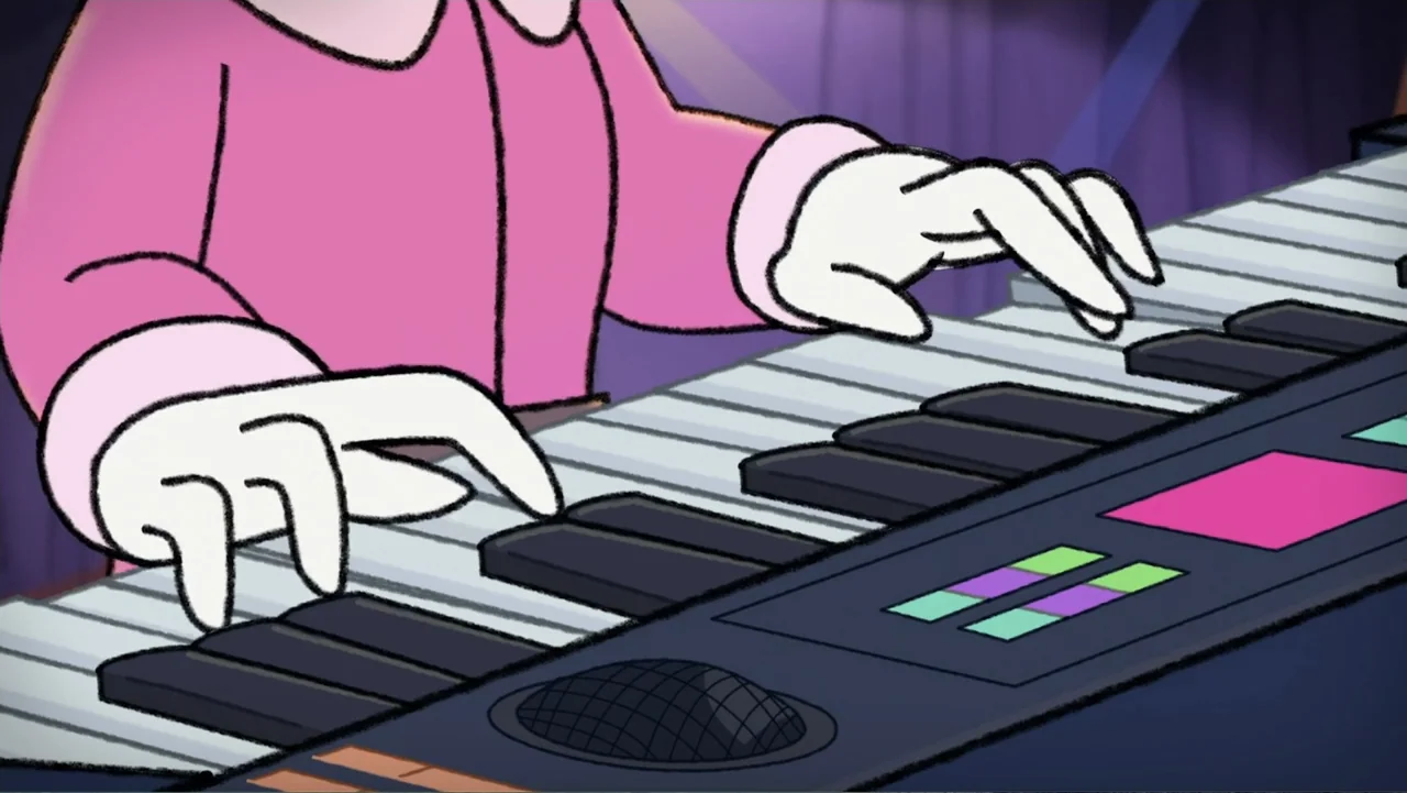 A Chuck E. Cheese Christmas (2025) movie still: closeup — Close-up of gloved hands playing a digital synthesizer in a brightly colored space. The…