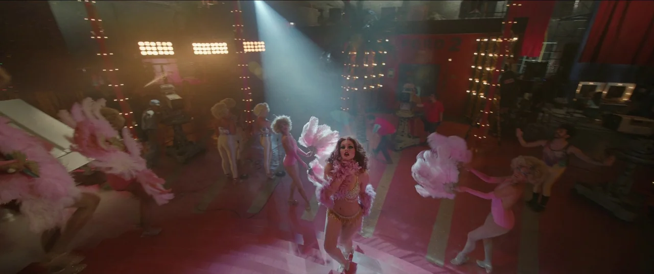 Bardo: False Chronicle of a Handful of Truths (2022) movie still: wide — A bustling television soundstage features a dance troupe performing under…