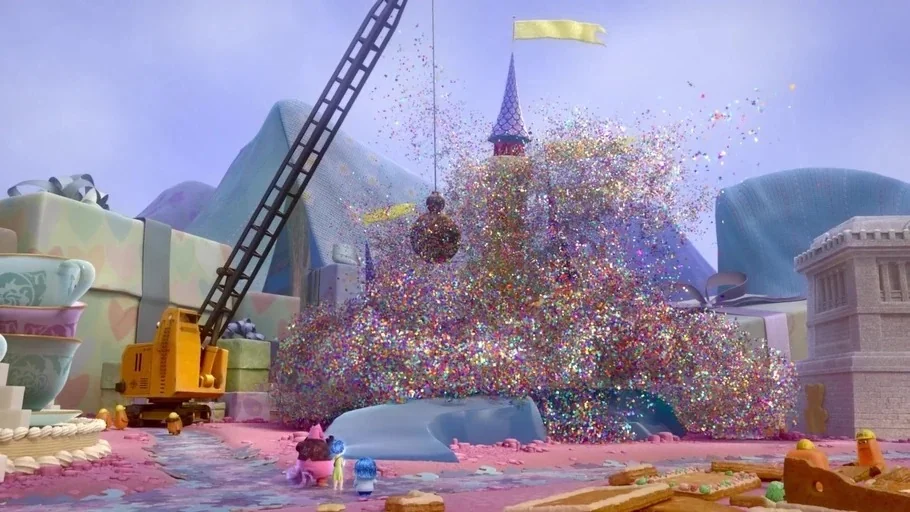 Inside Out (2015) movie still: wide — A surreal landscape made of giant gift boxes, teacups, and gingerbread-textured ground. A yellow construction…