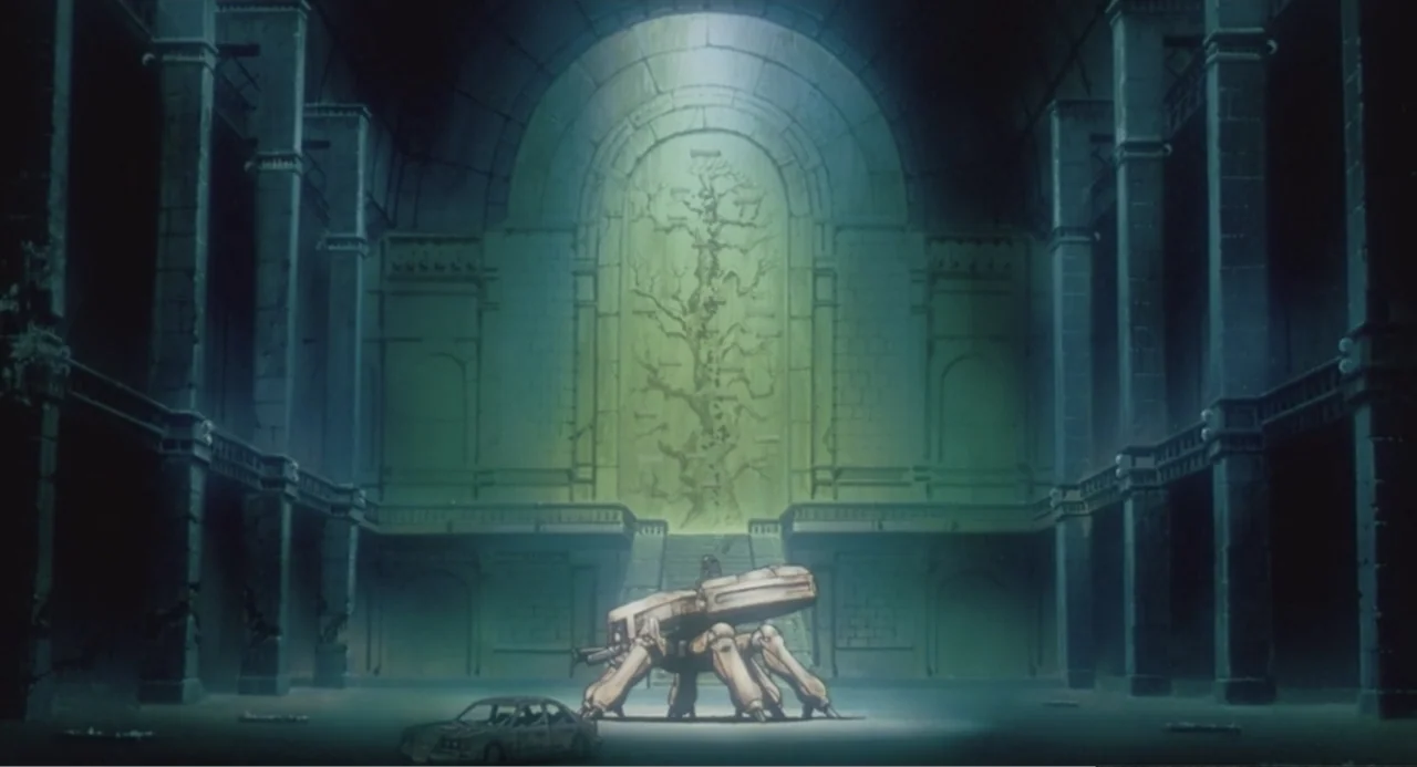 Ghost in the Shell (1995) movie still: wide — A massive, dimly lit vaulted hall features a large engraved stone wall relief. A mechanical walking…