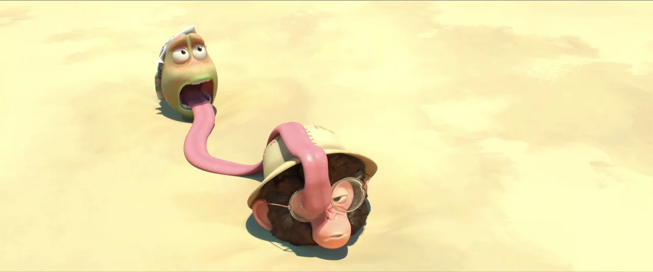 Around the World in 80 Days (2021) movie still: wide — An expanse of smooth yellow sand under bright daylight. A cartoonish creature with a long…