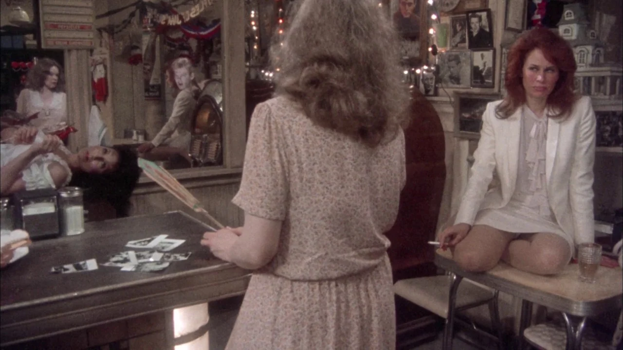 Come Back to the 5 & Dime Jimmy Dean, Jimmy Dean (1982) movie still: medium — A cluttered diner interior features walls covered in framed…