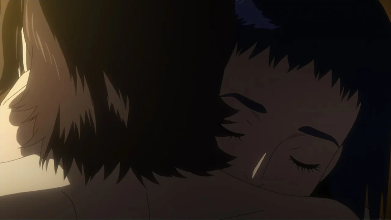 Ghost in the Shell: Arise - Border 3: Ghost Tears (2014) movie still: closeup — An interior bedroom space with low lighting focused on two figures.…
