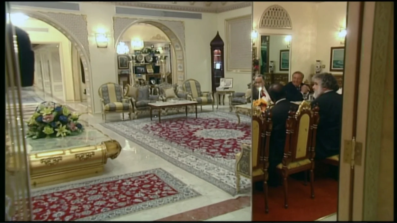 The FIFA Family: A Love Story (2017) movie still: wide — A spacious formal room features marble floors, elaborate patterned rugs, and arched…