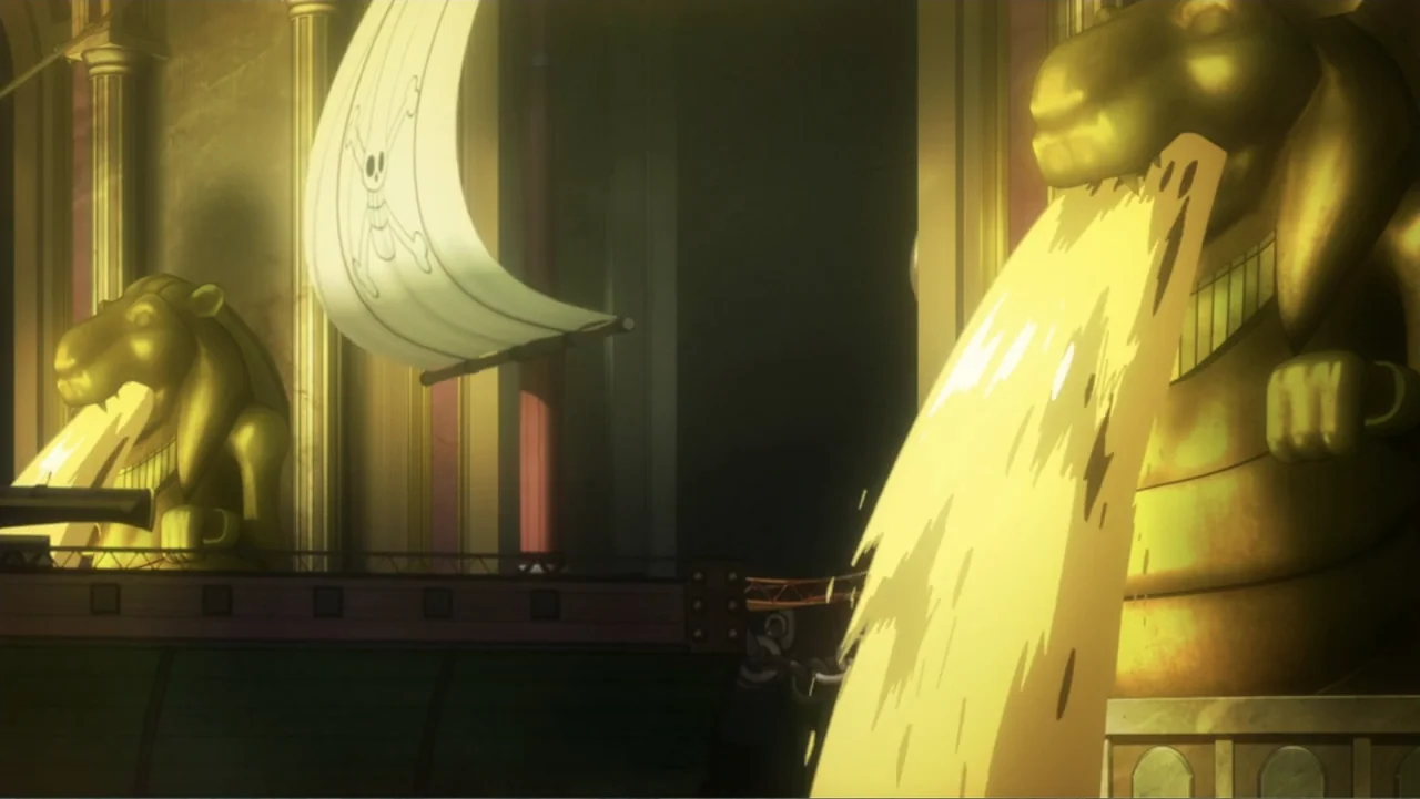 One Piece Film: GOLD (2016) movie still: wide — A ship deck features two large golden lion statues spraying streams of liquid. A white sail bearing…
