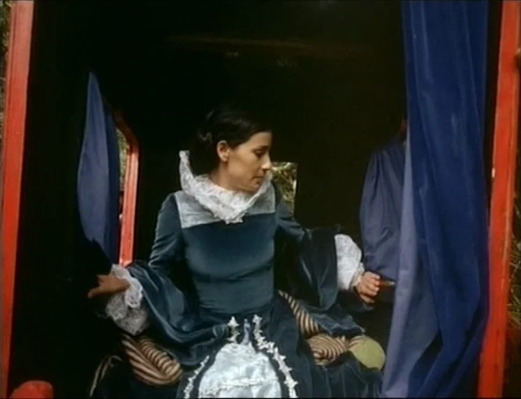 Aguirre, The Wrath Of God (Aguirre, der Zorn Gottes) (1972) movie still: medium — The interior of a horse-drawn carriage features bright red framing…