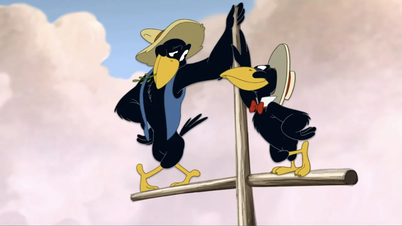 Tom and Jerry & The Wizard of Oz (2011) movie still: medium — Two animated crows perch on a wooden cross against a cloudy light blue sky. The taller…