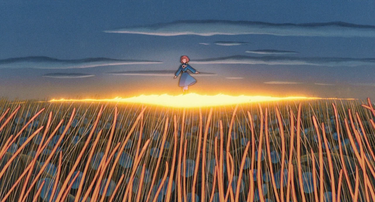 Nausicaä of the Valley of the Wind (1984) movie still: wide — A vast, grassy field stretches toward a distant horizon under a dark twilight sky. A…