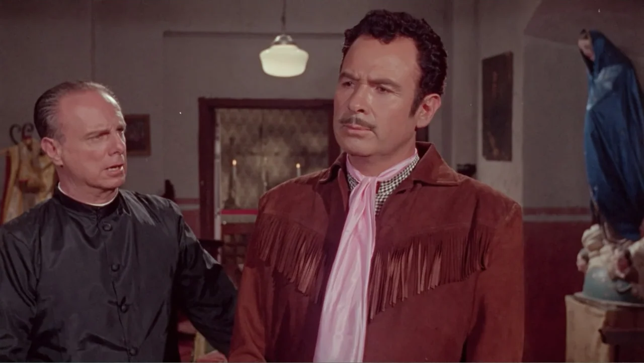 Los Dos Rivales (1966) movie still: medium — An interior space decorated with religious iconography including a large statue of the Virgin Mary. A…