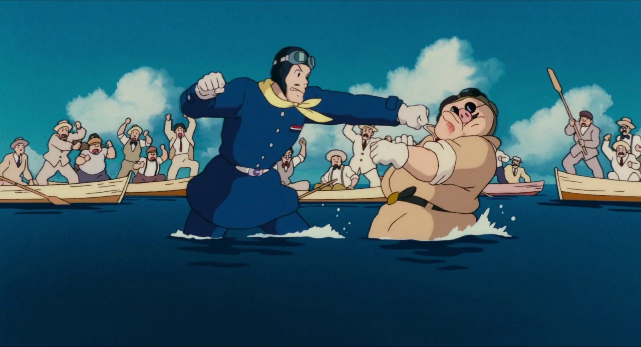 Porco Rosso (1992) movie still: wide — Two men fight in shallow blue water surrounded by several wooden rowing boats. Onlookers in the boats watch…