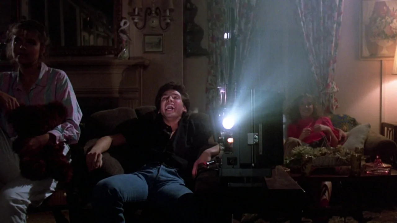 Friday the 13th: The Final Chapter (1984) movie still: medium — A dimly lit room with floral curtains and a fireplace featuring a mantle decoration.…
