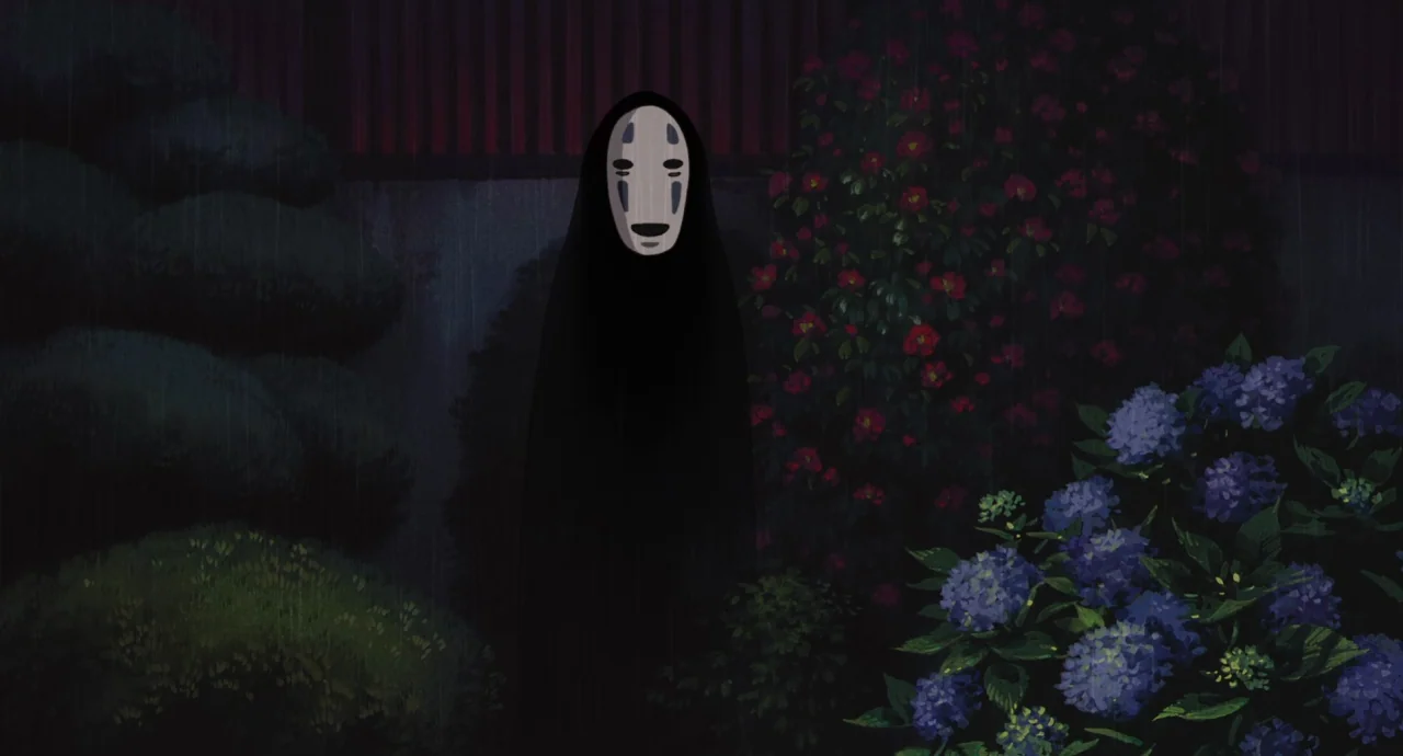 Spirited Away (2001) movie still: medium — A dark night courtyard features lush shrubbery with bright red and blue flowers in rain. A mysterious…