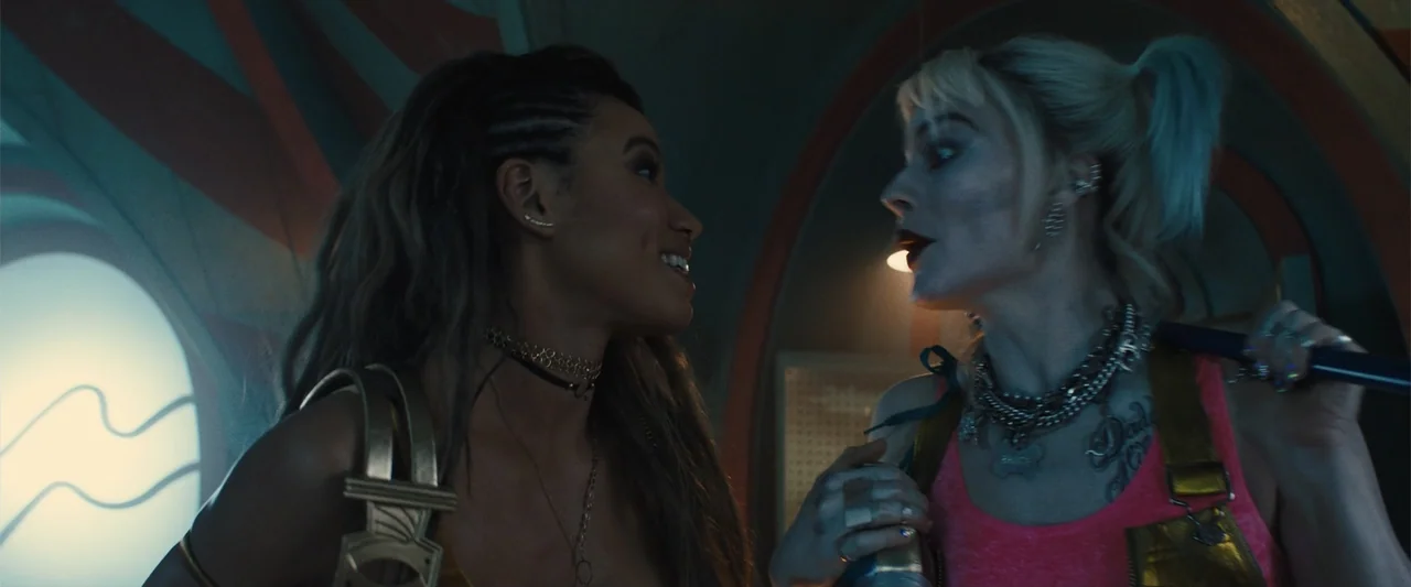 Birds of Prey (and the Fantabulous Emancipation of One Harley Quinn) (2020) movie still: medium — A dimly lit interior space with curved…