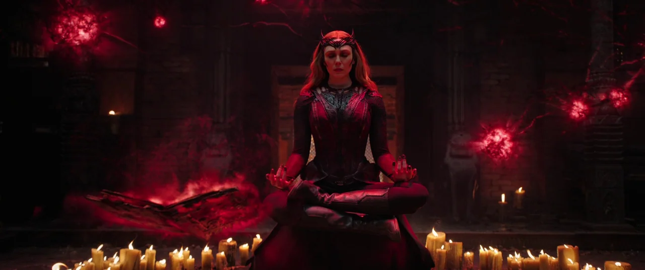 Doctor Strange in the Multiverse of Madness (2022) movie still: medium — A dark stone chamber features a ring of flickering candles on the ground. A…