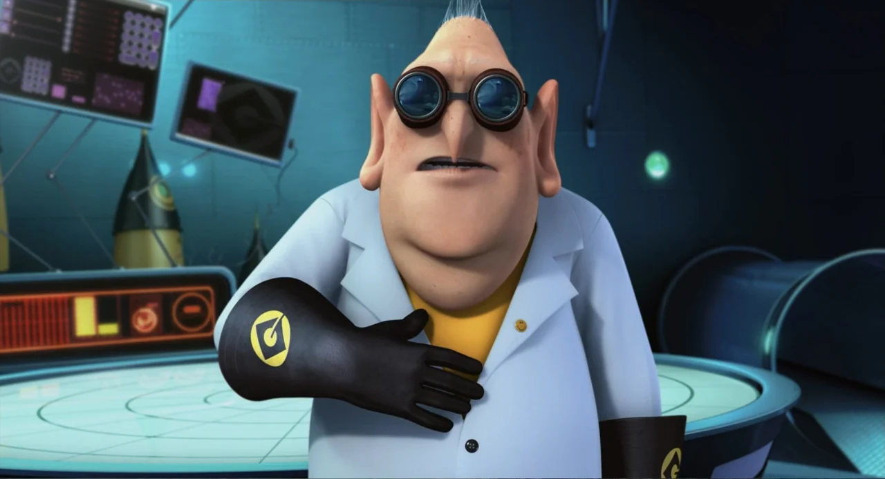 Despicable Me (2010) movie still: medium — A high-tech laboratory features glowing control panels and rounded blue metallic surfaces. A middle-aged…