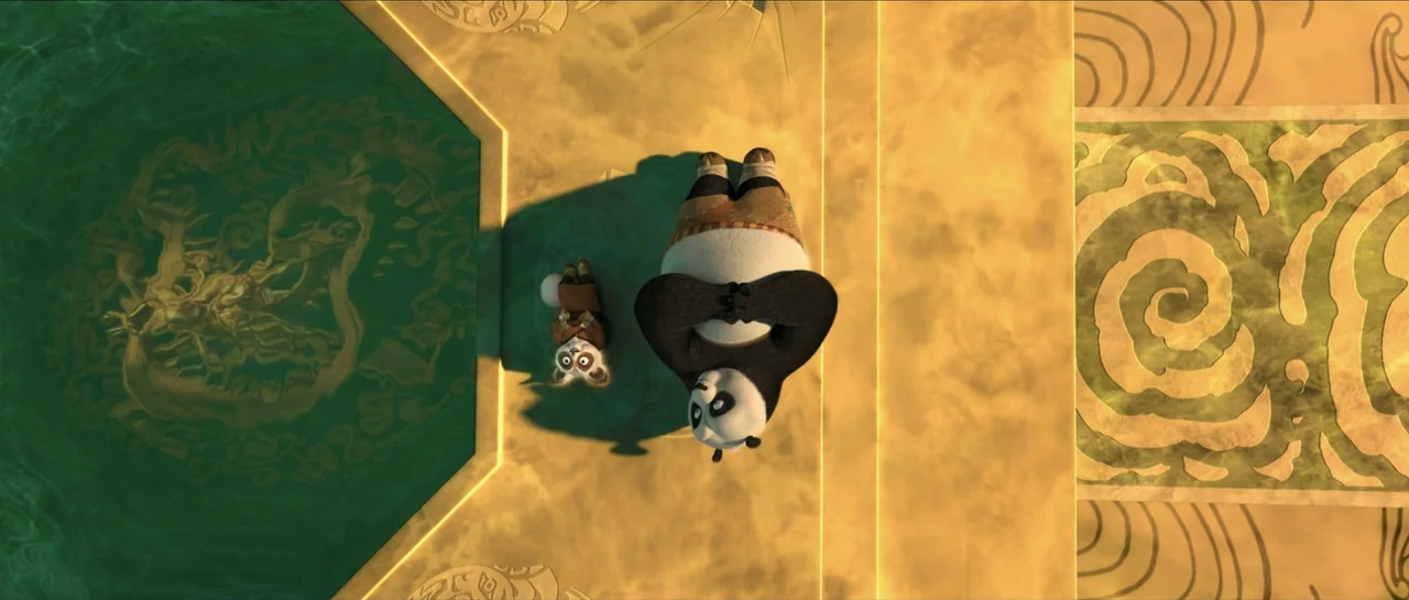 Kung Fu Panda (2008) movie still: fullbody — An ornate paved area with yellow tiles borders a rectangular pool of green water. A panda and a small…