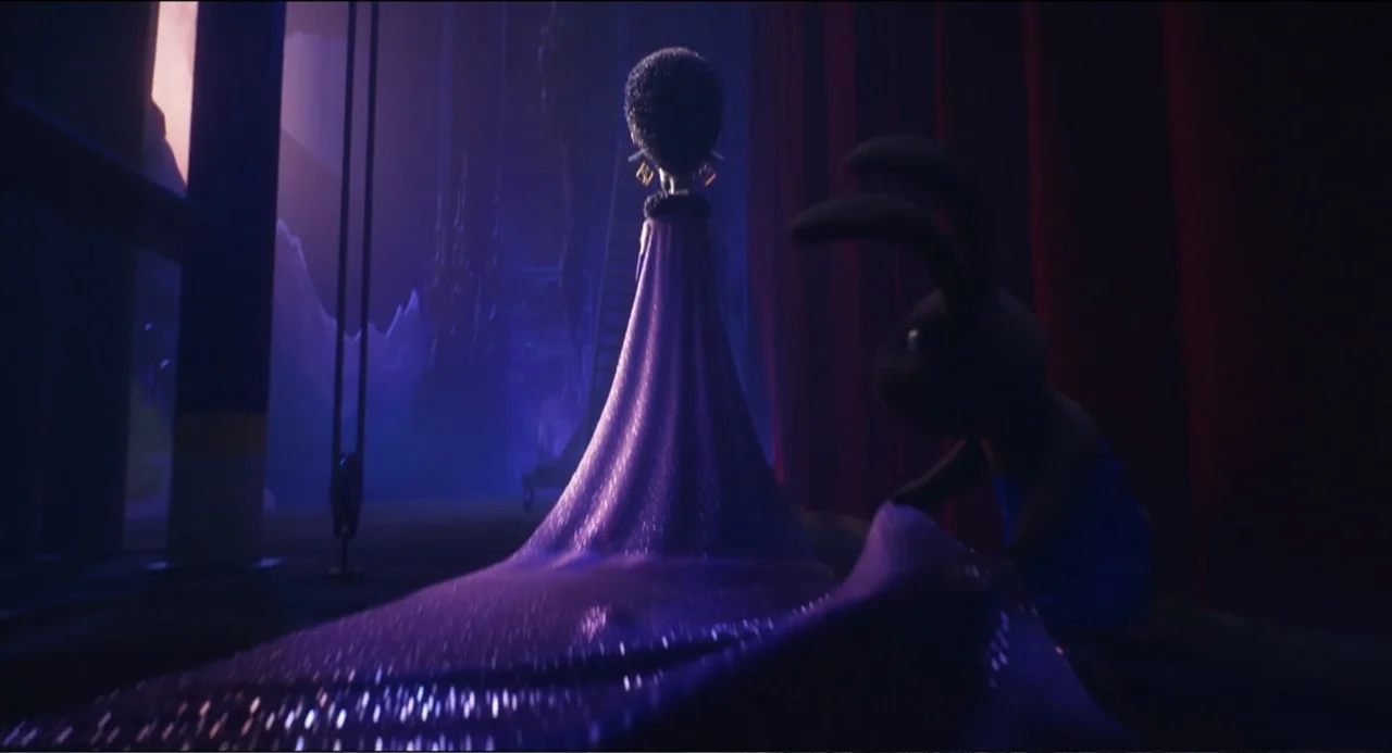 Sing (2016) movie still: fullbody — A dimly lit backstage area features heavy curtains and dark shadows. A woman in a long purple gown stands while…