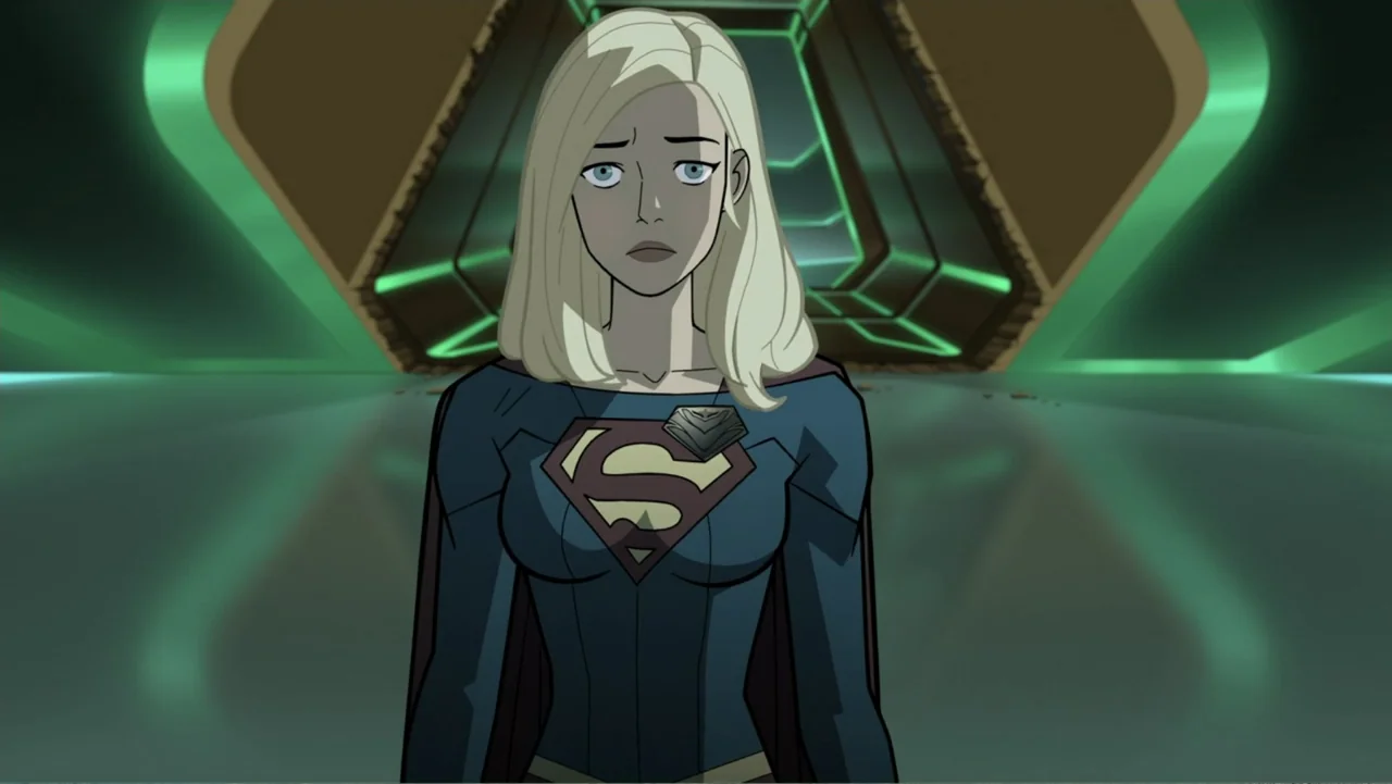 Legion of Super-Heroes (2023) movie still: medium — A futuristic corridor interior features metallic surfaces and glowing green linear light…