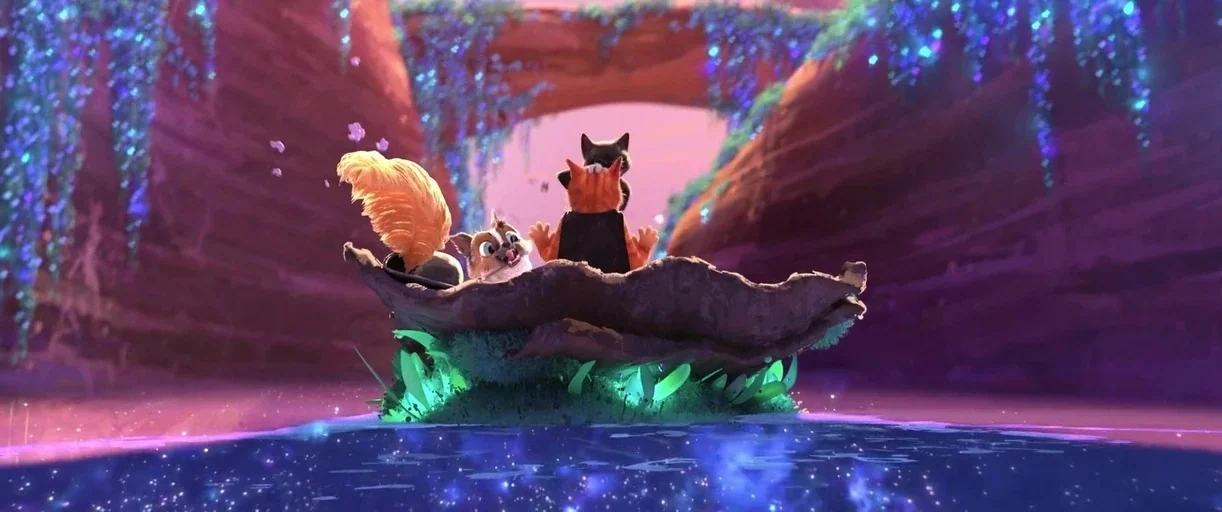 Puss in Boots: The Last Wish (2022) movie still: wide — A magical grotto features bioluminescent blue plants draped over deep red stone archways.…