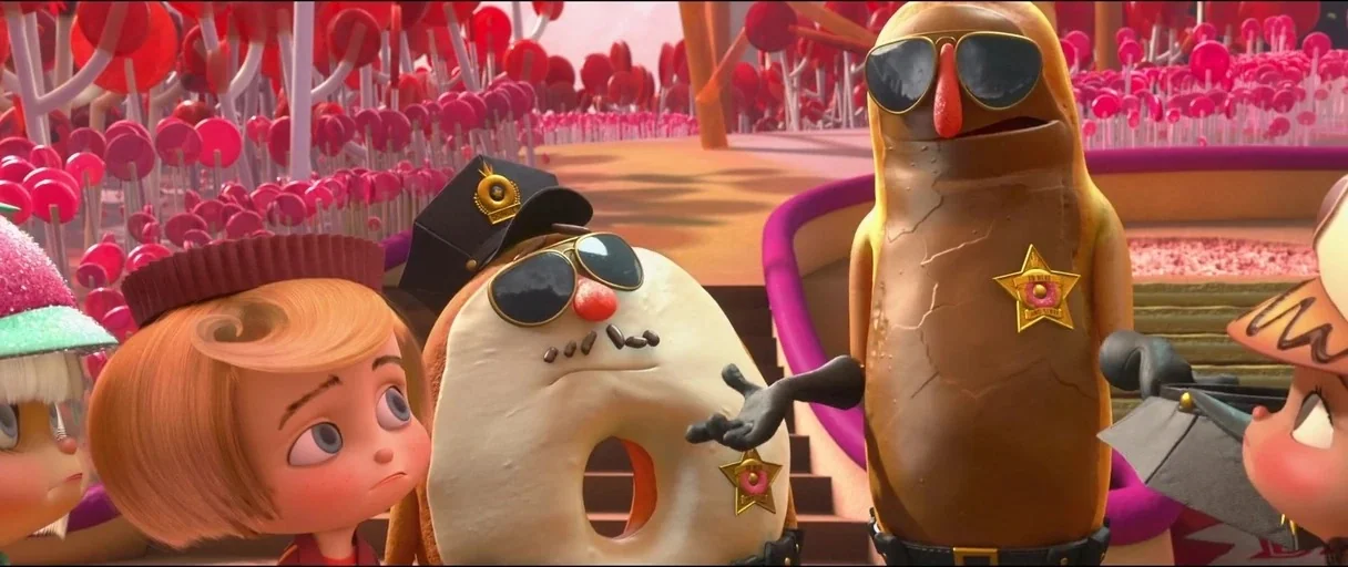 Wreck-It Ralph (2012) movie still: medium — A stylized candy landscape features rows of pink lollipops and curved pathways. Anthropomorphic food…
