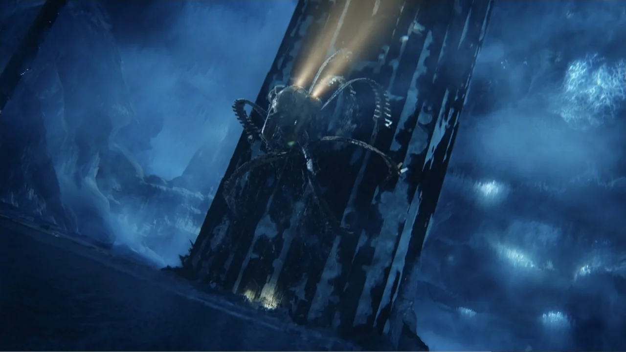 Aquaman and the Lost Kingdom (2023) movie still: wide — A tall, dark pillar stands in a desolate, frozen, and icy wasteland. A multi-legged…