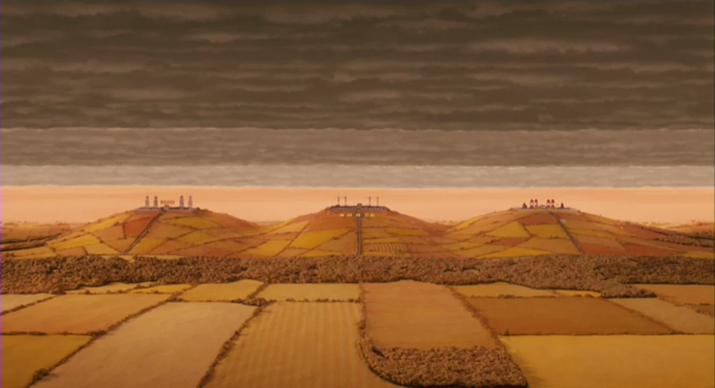 Fantastic Mr. Fox (2009) movie still: establishing — A wide view shows three rolling hills with agricultural structures atop them in a valley. The…