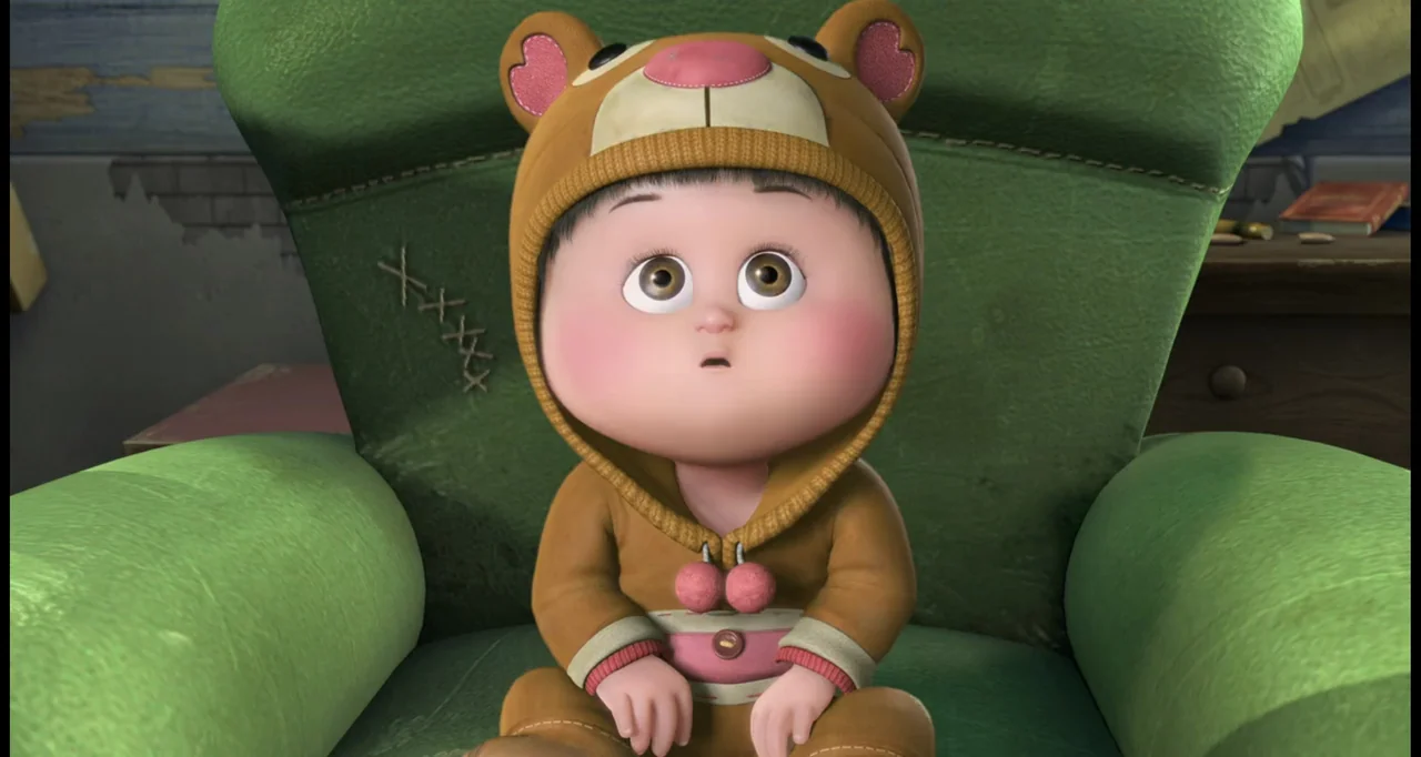 Boonie Bears: To the Rescue (2014) movie still: closeup — A toddler wearing a bear suit sits upright in a large, plush green armchair. The child…