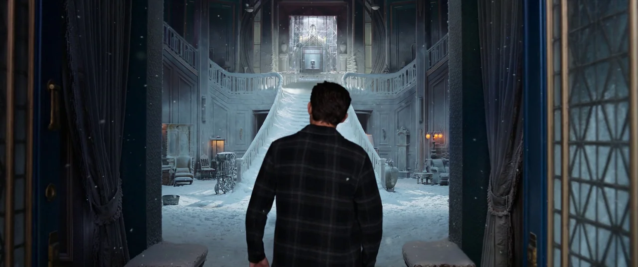 Spider-Man: No Way Home (2021) movie still: medium — A grand, snow-covered mansion interior with a large central staircase and heavy curtains. A man…