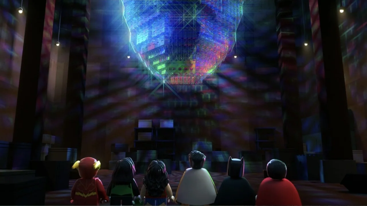 LEGO DC: Shazam! Magic and Monsters (2020) movie still: wide — A dark warehouse contains a large, geometric crystal structure hovering in mid-air…