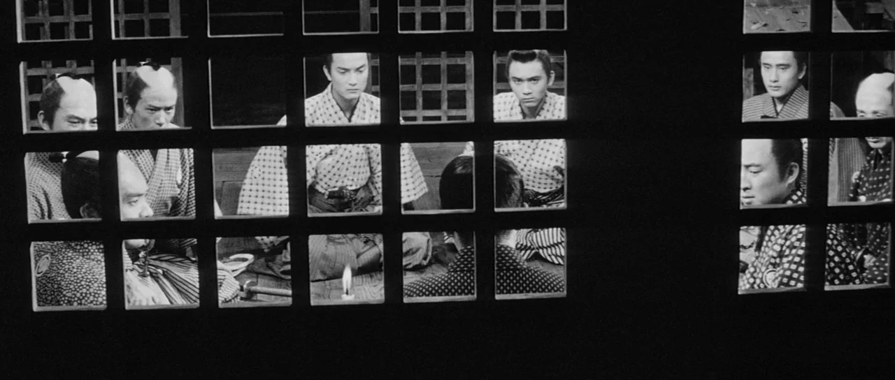Sanjuro (1962) movie still: medium — Multiple samurai sit in a dark room seen through the wooden grid of a screen. Each man occupies a separate…