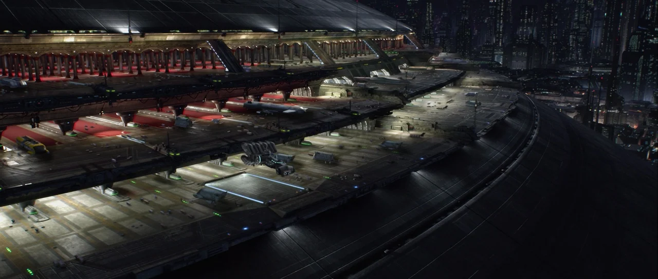 Star Wars: Episode III – Revenge of the Sith (2005) movie still: establishing — A vast, multi-level futuristic landing platform stretches across the…