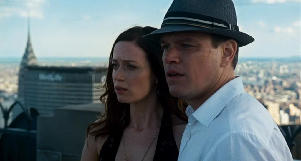 The Adjustment Bureau (2013) movie still: medium — A high-altitude outdoor terrace overlooking the New York City skyline with the Chrysler Building.…