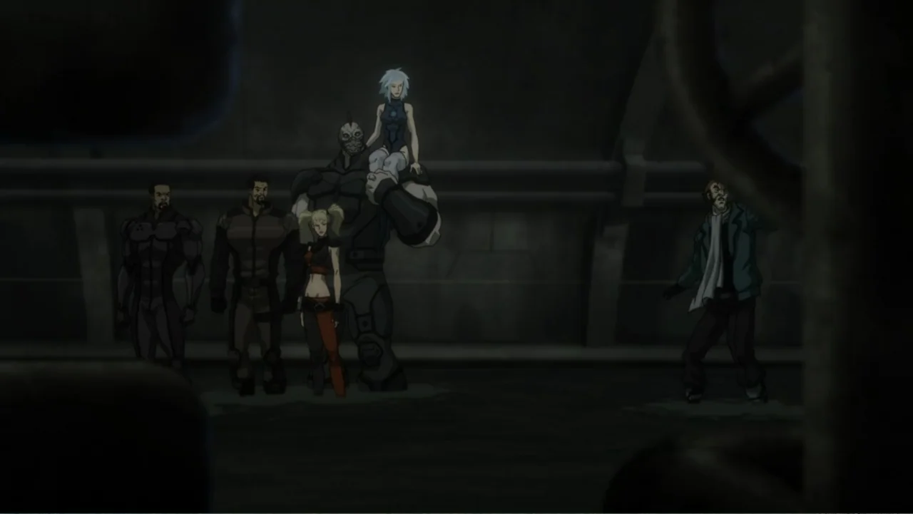 Batman: Assault on Arkham (2014) movie still: fullbody — A dark, utilitarian industrial facility with metallic walls and structural piping visible.…