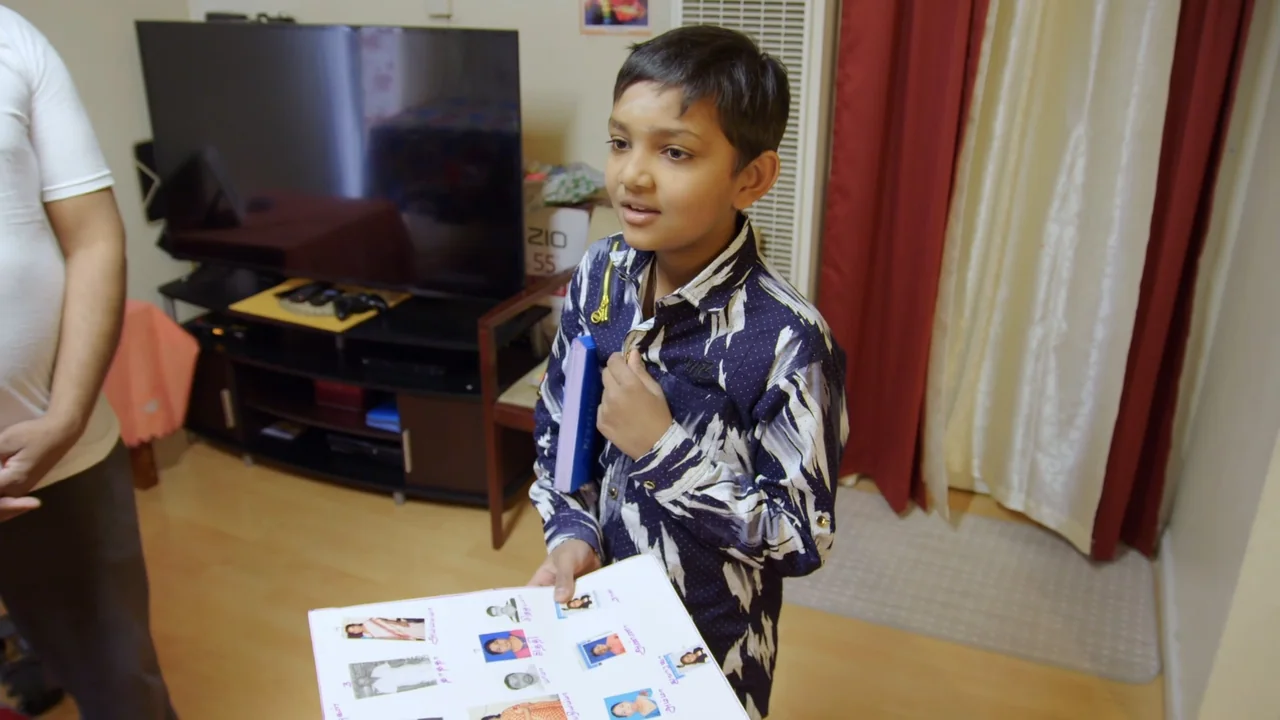 We Are the Dream: The Kids of the Oakland MLK Oratorical Fest (2020) movie still: medium — A residential living room contains a television, a media…