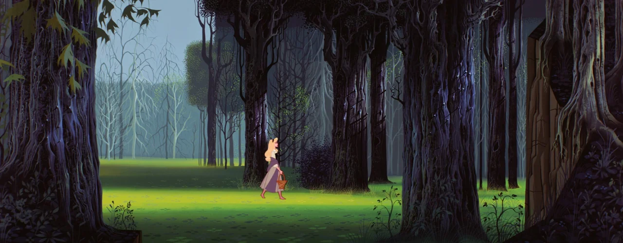 Sleeping Beauty (1959) movie still: wide — A clearing surrounded by large, thick, dark trees with tall trunks and sparse foliage. A young woman…