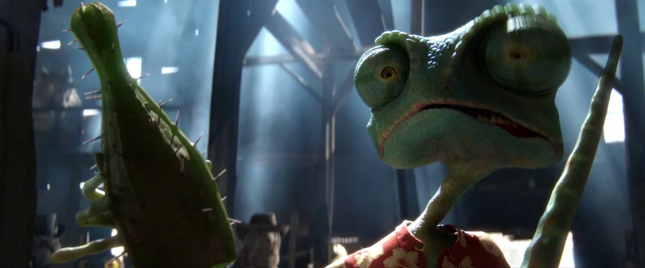 Rango (2011) movie still: closeup — The interior of a dusty wooden structure features strong shafts of sunlight piercing through. A green lizard…