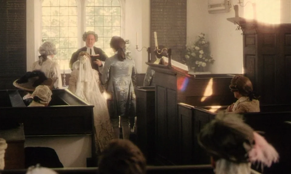 Black Jack (1979) movie still: wide — A rustic 19th-century church interior features wooden pews and stone walls with large windows. A bride in lace…