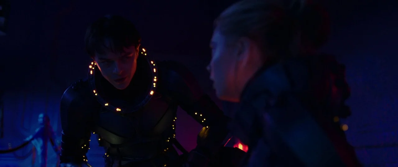 Valerian and the City of a Thousand Planets (2017) movie still: medium — A dimly lit, futuristic space station corridor with dark surfaces and…