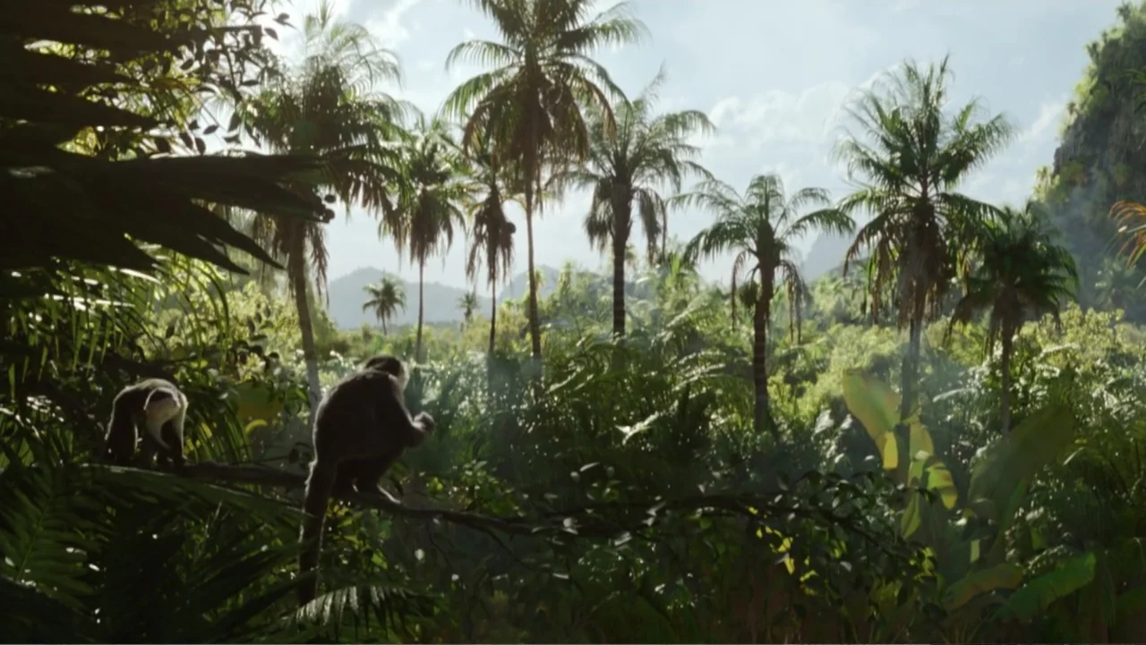 Jurassic World Rebirth (2025) movie still: wide — A dense tropical rainforest features numerous tall palm trees and thick jungle vegetation. Two…