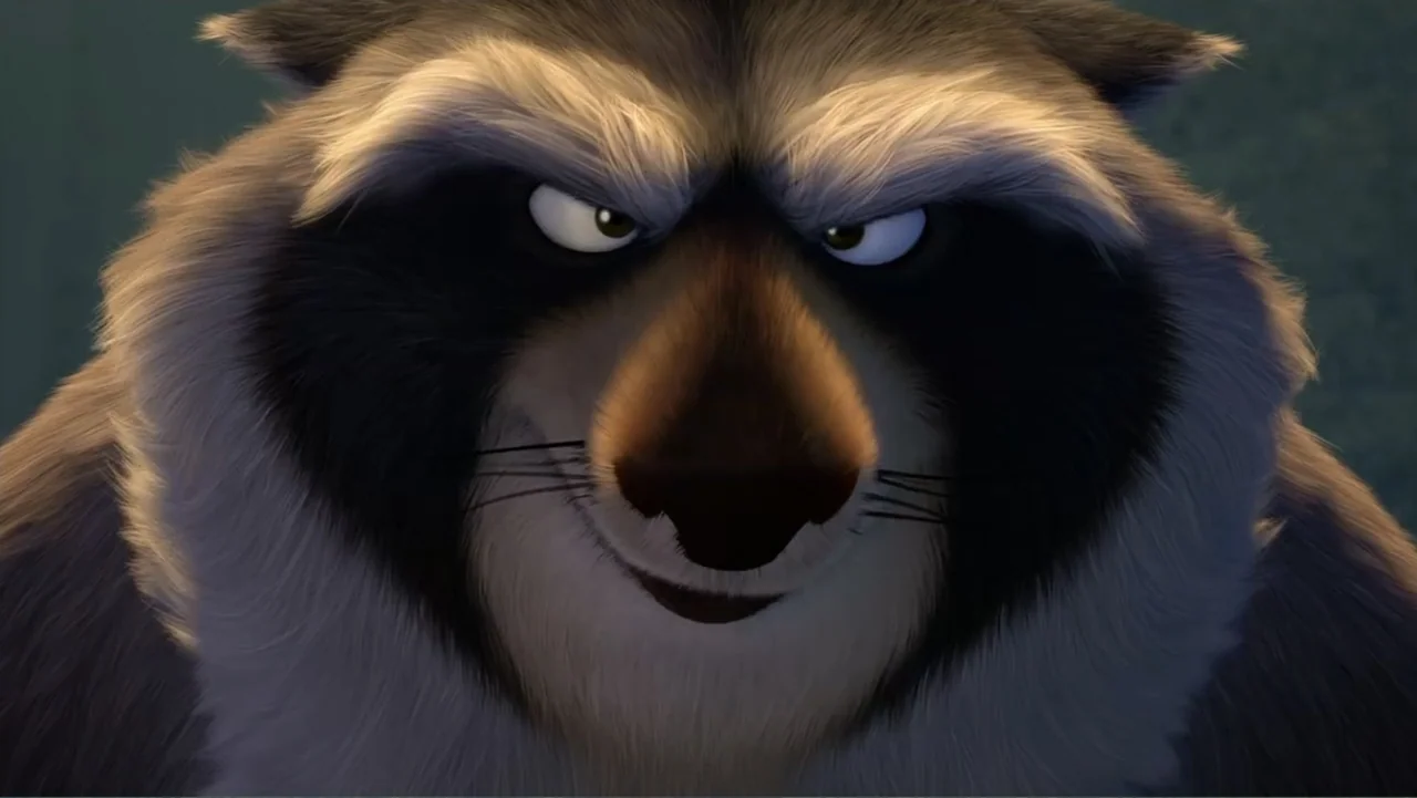 The Nut Job (2014) movie still: closeup — A dark indoor space provides the setting for a close encounter with a raccoon. The anthropomorphized…