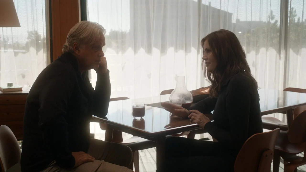 Marjorie Prime (2017) movie still: medium — A light-filled room contains a sleek table with glasses and a glass pitcher. A man and a woman sit…