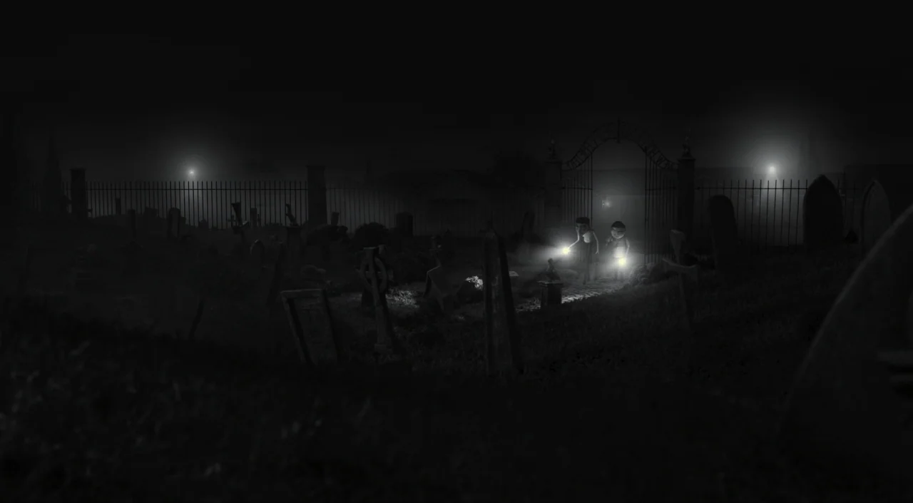 Frankenweenie (2012) movie still: wide — A dark, foggy cemetery at night is enclosed by high iron fencing. Two small children stand by the open main…