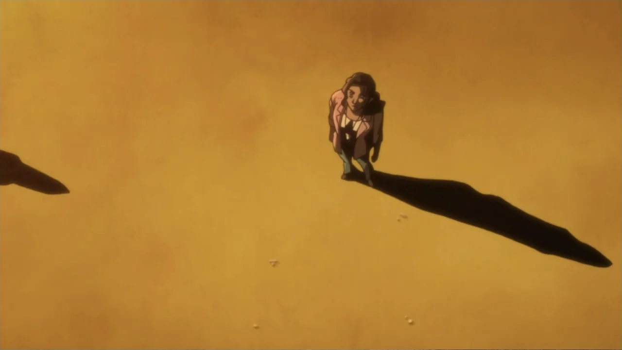 Batman: Gotham Knight (2008) movie still: wide — A woman stands in a wide, desolate expanse of golden, arid, sandy terrain. She is the lone figure,…