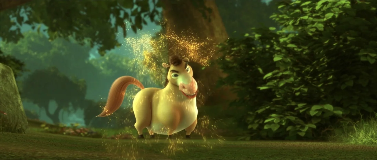 Cinderella and the Secret Prince (2018) movie still: fullbody — A lush grassy clearing bordered by dense green trees and thick bushes. A small,…